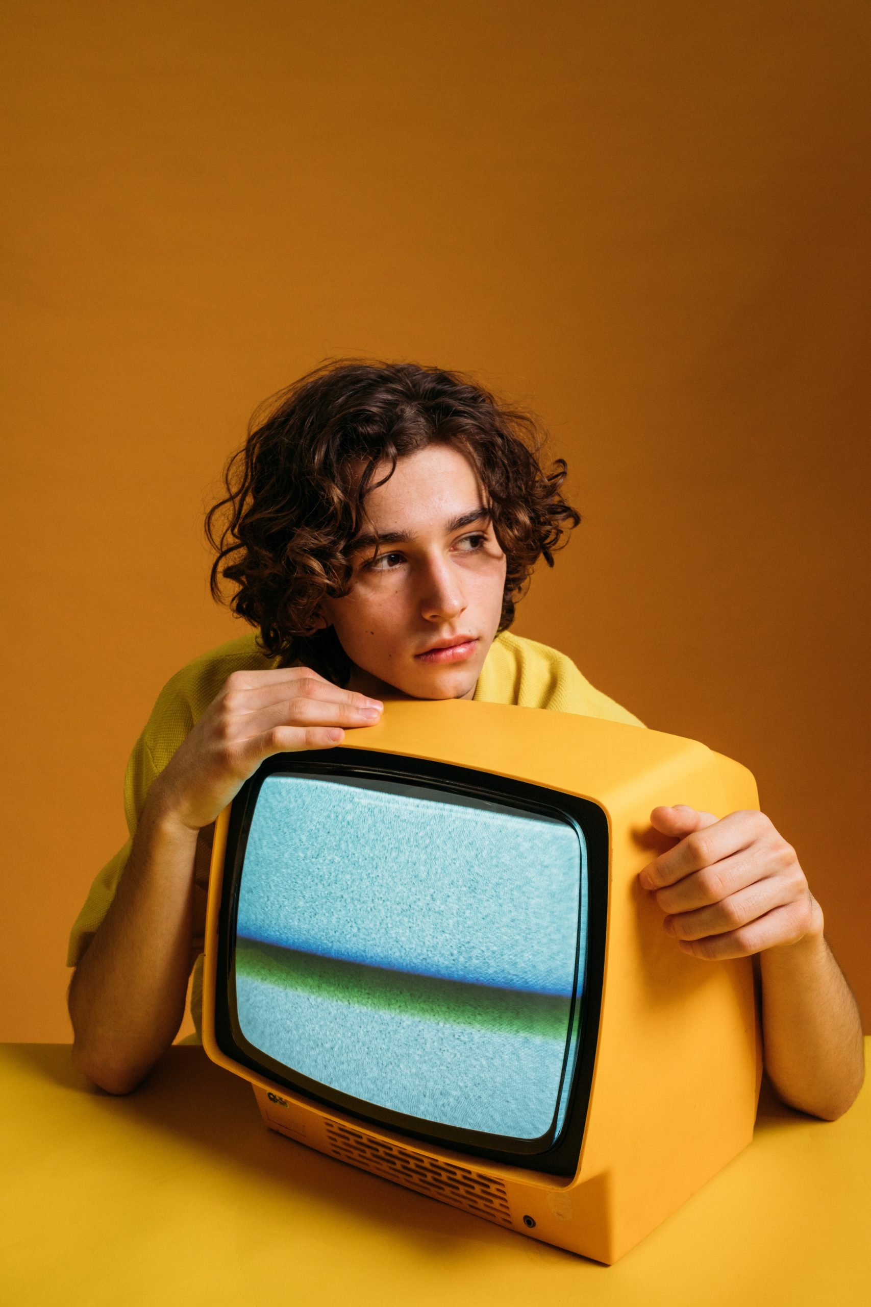 image of a teen with a television in need of alcohol treatment