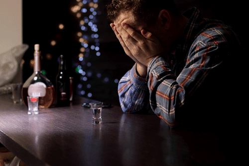 drunk man at bar in winter