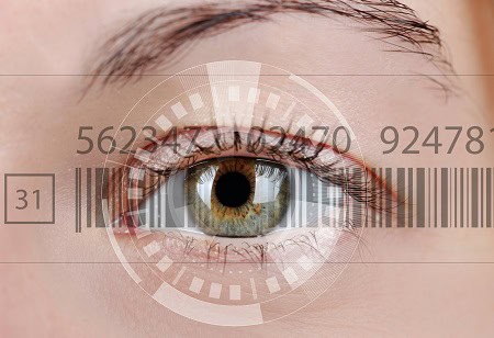 Human eye with integrated barcode to symbolize the relationship between Internet addiction and attention