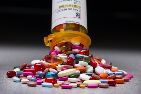 image of pill bottle with meds promoting drug take-back day