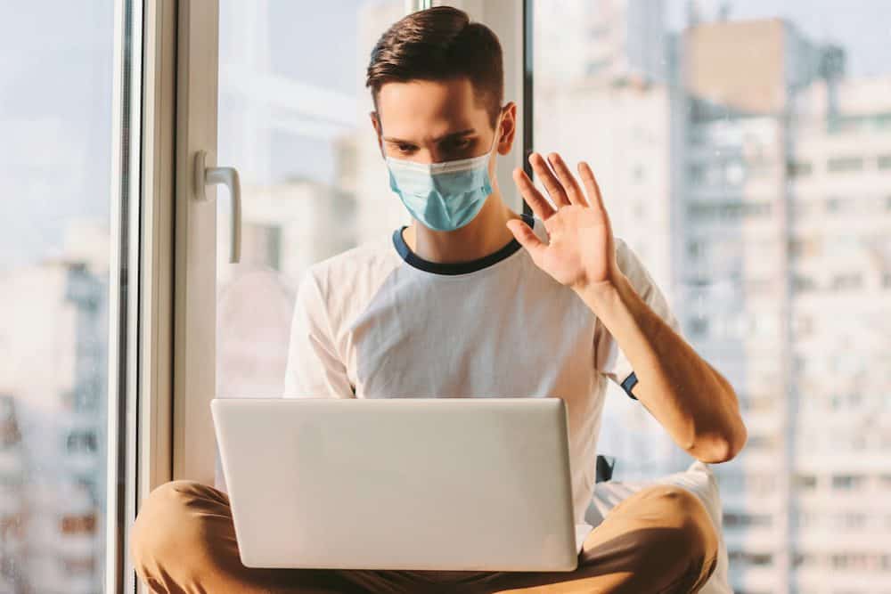 Man attending telehealth during the pandemic to curb addiction