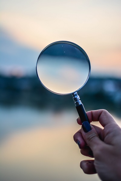 image of magnifying glass to represent research