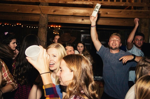 image of college students partying to emphasize advocating for safer substance use