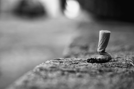 image of snubbed out cigarette butt to illustrate quitting addiction